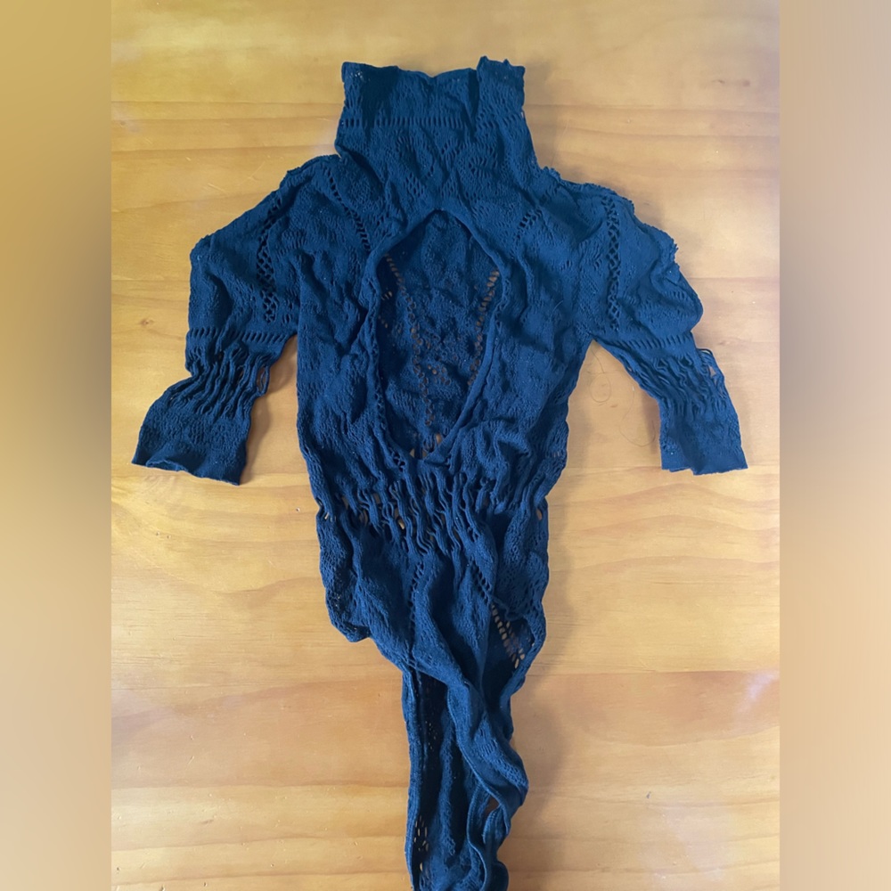NWOT fishnet mock neck sleeved bodysuit with keyhole back.